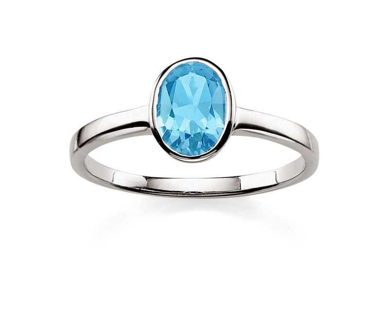 Silver blue topaz ring